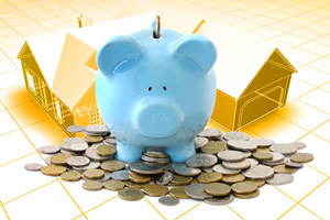 Overloaded blue piggy bank, surrounded by gold and silver coins.